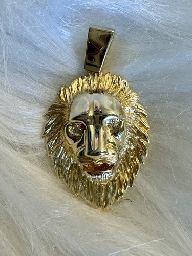 14k yellow gold lion - &,