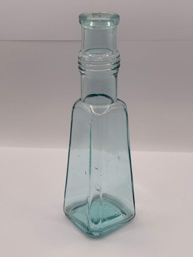 Old aqua glass sauce bottle