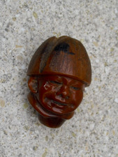 Unusual rare carved nut face head polished red brown wood antique?