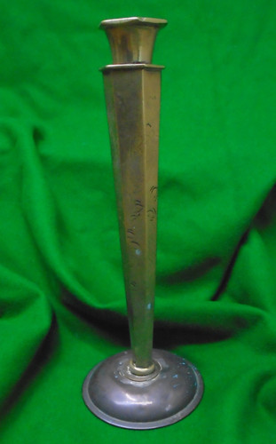 Brass candle stick maybe - candle,