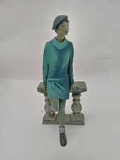 Elegant Lady Resin Figurine Sitting on Stone Bench in Blue Outfit - Piazza