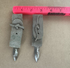 2 Corn Huskers old farm tool