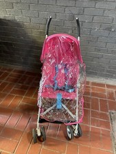Childrens push chair. Very good conditions. Complete with tain cover