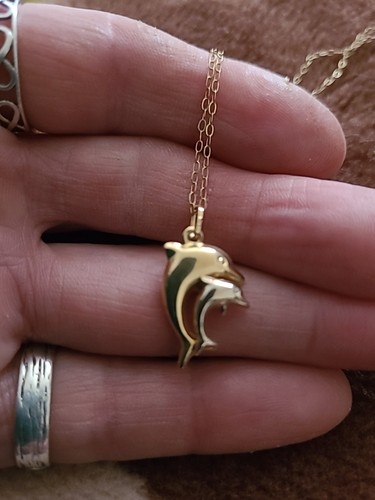9carot gold dolphin and baby - and,
