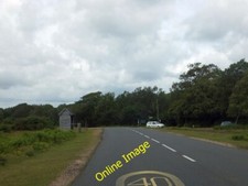 Photo 6x4 Bus shelter and road