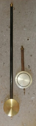 Vintage cased clock pendulums - cased,