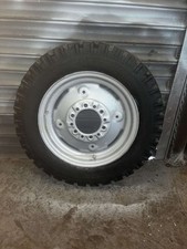 LEYLAND, MARSHALL OR NUFFIELD TRACTOR FRONT WHEEL AND TYRE, 6.00 X 16.
