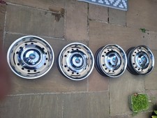 TR4 steel wheels with chrome hub caps & stainless embellishers