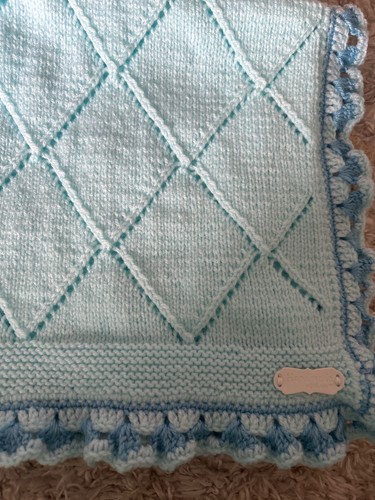 Hand made knitted baby - hand,