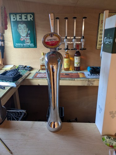 Amstel beer pump - full, bar