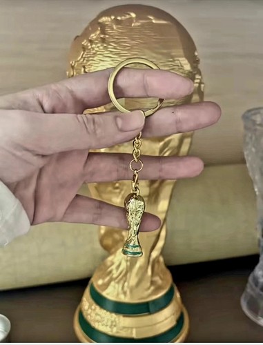 Gold tone football world - gold,