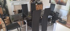 Black glass and chrome dining