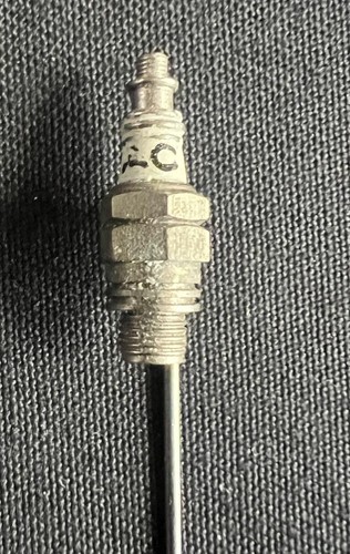 Spark plug lapel - ac,