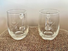 Two Curling stone drinks mugs