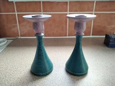 A "PAIR" OF HAND CARVED OAK WOOD CANDLE STICKS,JADE AND PINK .