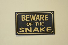 BEWARE OF THE SNAKE sign or