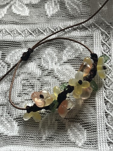 Macrame bracelet with - , flower