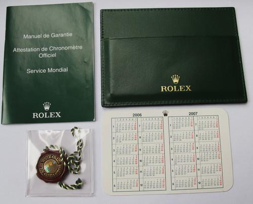 Rolex calendar wallet - rolex,