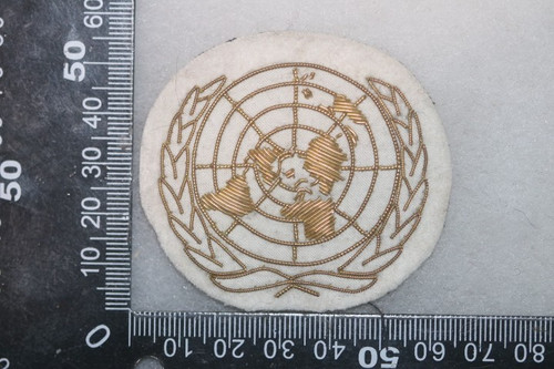United nations beret badge - un,