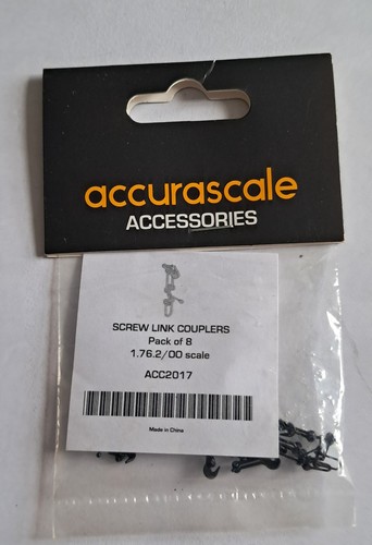 Pack screw link couplers - of,