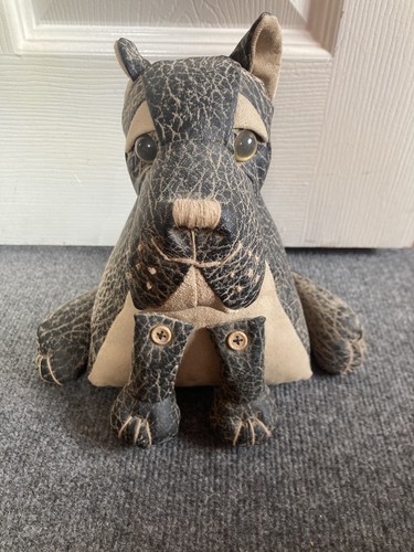Dora designs sitting dog