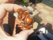 Hand Carved wood netsuke of a