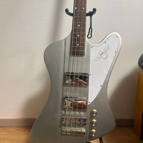 Silver electric bass guitar - electric,