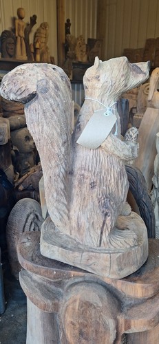 Chainsaw carving squirrel home - squirrel,