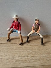 Two Schleich Horse Riders