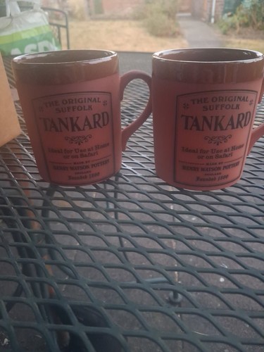 Two terracotta tankards - two,
