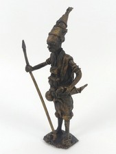 A Benin bronze figure of a
