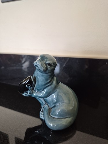 Poole pottery otter with - -,