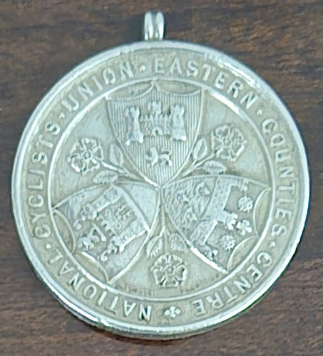 Solid silver cyclist medal - silver,
