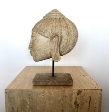 Buddha head on stand