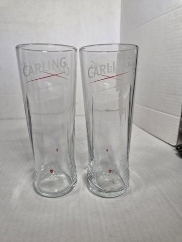 Carling half pint glasses - half,