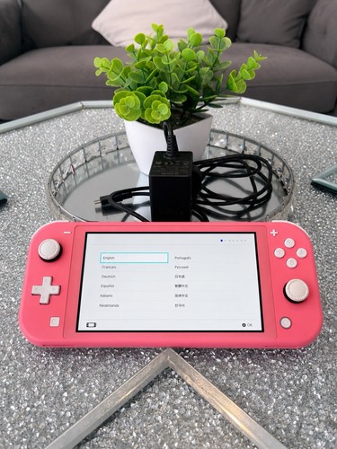 Nintendo switch lite coral - nintendo,