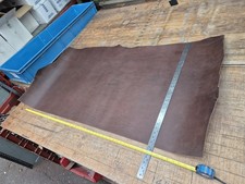 Dark brown hide - dark, heavy
