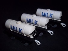 THREE TOMY ROLLING STOCK MILK