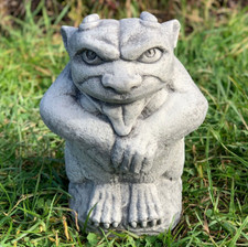 Playful monster figurine Stone