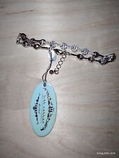 Alan Hannah Silver Tone Clear