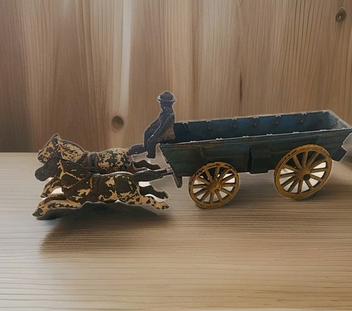 Antique cast iron horse drawn - cast,