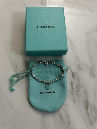 Return tiffany co - to,