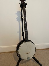 Saga 5 string resonator banjo with hardcase, strings, picks, beginner book