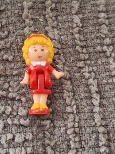 Polly pocket her - in,