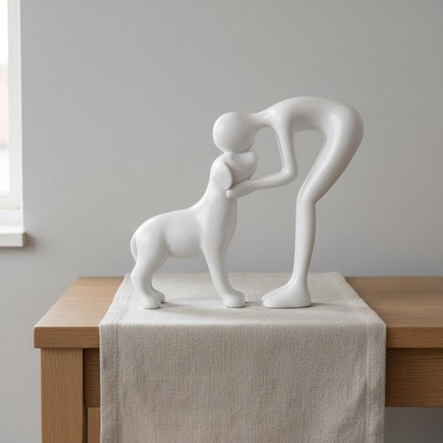 Human and dog statue - and,