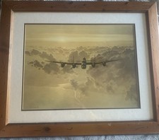 Avro Lancaster Crossing the Coast - Framed print by Gerald Coulson