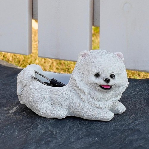 Pomeranian dog figurine animal - pomeranian,