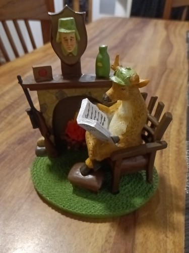 Buck deer reading paper - buck,