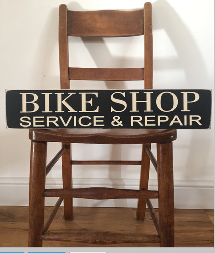Bike shop sign repairs - shop,