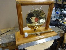Brass and wood - wood, gong.